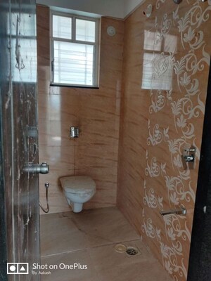 Bathroom in 2 BHK Apartment at Brahma Park, Wakad – for Rent
