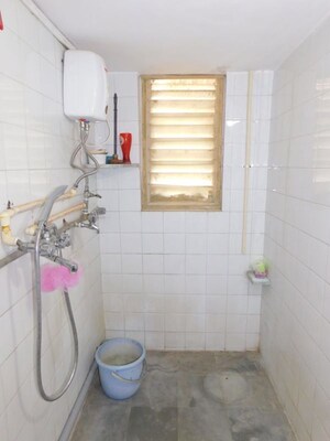 Bathroom in 2 BHK Apartment at Shram Saphaly Apartment, Vile Parle West – for Rent