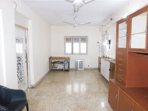 Living Room in 2 BHK Apartment at Shram Saphaly Apartment, Vile Parle West – for Rent