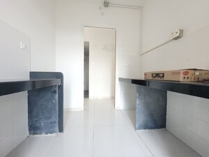 Kitchen in 1.5 BHK Apartment at Godrej Emerald, Ghodbunder Road – for Rent
