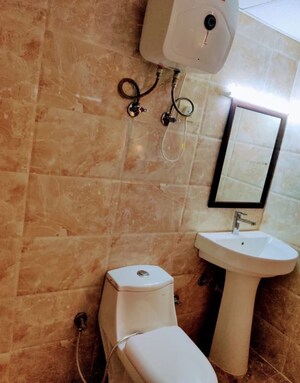 Bathroom in 1 RK Apartment at Supertech Czar Suites, Omicron I Greater Noida – for Rent