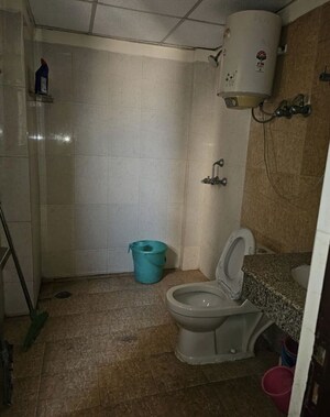 Bathroom in 1 RK Apartment at Supertech Czar Suites, Omicron I Greater Noida – for Rent