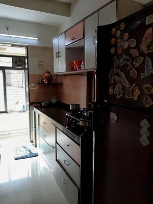 Kitchen in 1 BHK Apartment at Group Satellite Elegance, Goregaon East – for Sale