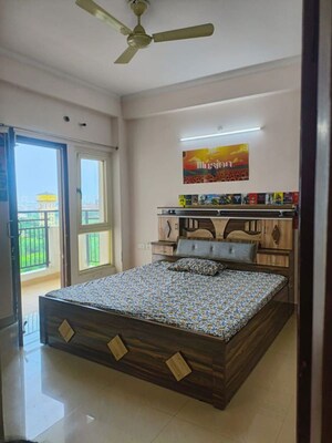 Bedroom in 3 BHK Apartment at AWHO 8B, Vrindavan Yojna – for Rent