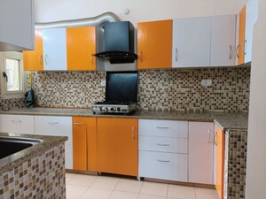 Kitchen in 3 BHK Apartment at AWHO 8B, Vrindavan Yojna – for Rent