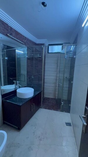 Bathroom in 4 BHK Builder Floor at Nehru Enclave – for Rent