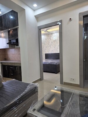 Living Room in 2 BHK Apartment at Casa Woodstock, Sector 16c Greater Noida – for Rent