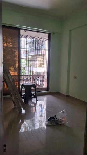 Living Room in 1 BHK Apartment at Divine Solitaire, Ulwe – for Rent