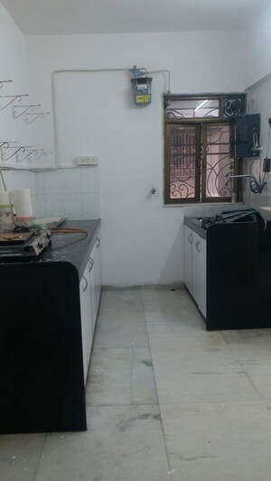 Kitchen in 2 BHK Apartment at Nivant Apartment Vile Parle, Vile Parle West – for Rent