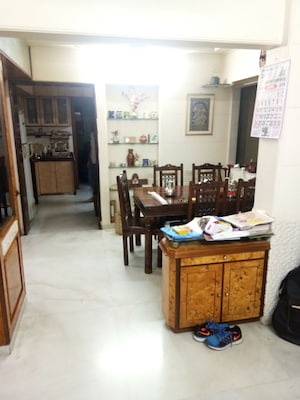 Living Room in 1 BHK Apartment at Unique Tower, Sion – for Rent