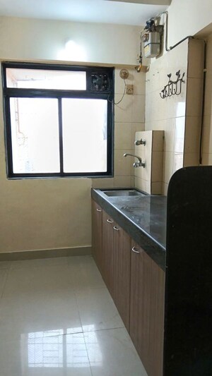 Kitchen in 1 BHK Apartment at Dheeraj Solitaire, Malad West – for Rent