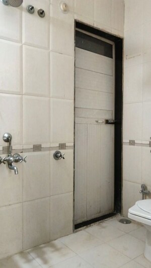 Bathroom in 1 BHK Apartment at Dheeraj Solitaire, Malad West – for Rent