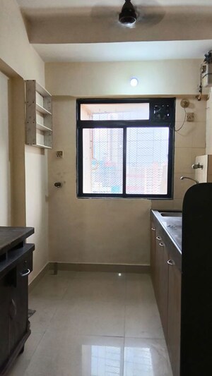Kitchen in 1 BHK Apartment at Dheeraj Solitaire, Malad West – for Rent