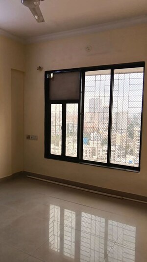 Room in 1 BHK Apartment at Dheeraj Solitaire, Malad West – for Rent