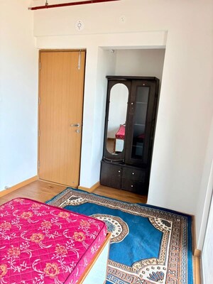 Bedroom in 2 BHK Apartment at Gera Planet Of Joy, Kharadi – for Rent