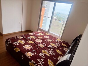 Bedroom in 2 BHK Apartment at Gera Planet Of Joy, Kharadi – for Rent