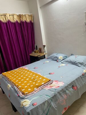 Bedroom in 2 BHK Apartment at Satyam Aracade, Wadgaon Sheri – for Rent