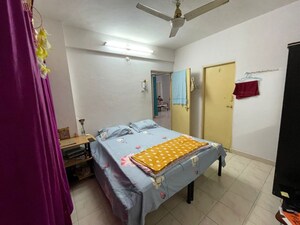 Bedroom in 2 BHK Apartment at Satyam Aracade, Wadgaon Sheri – for Rent