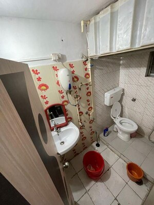 Bathroom in 2 BHK Apartment at Satyam Aracade, Wadgaon Sheri – for Rent