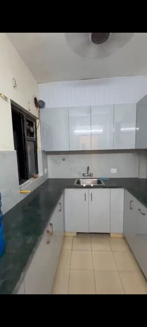 Kitchen in 2 BHK Apartment at Ansal Crown Heights, Sector 80 – for Rent