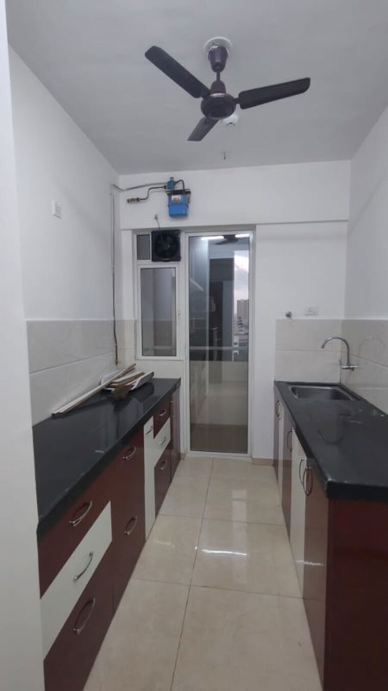 Kitchen, mahindra-centralis-tower-3 2 Bedroom 594 Sq.Ft. Apartment In Pimpri Pune 10651254