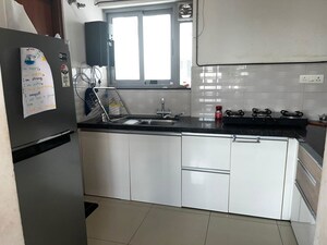 Kitchen in 2 BHK Apartment at Marvel Fria, Wagholi – for Rent