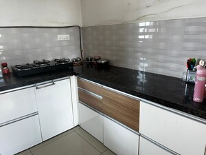 Kitchen in 2 BHK Apartment at Marvel Fria, Wagholi – for Rent
