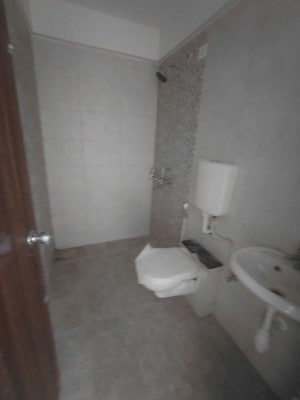 Bathroom in 2 BHK Apartment at Marvel Fria, Wagholi – for Rent