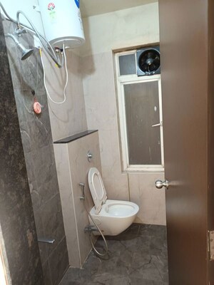 Bathroom in 2 BHK Apartment at Mantra Insignia, Mundhwa – for Rent