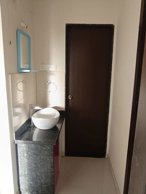 Bathroom in 2 BHK Apartment at Mantra Insignia, Mundhwa – for Rent