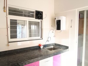 Kitchen in 2 BHK Apartment at Mantra Insignia, Mundhwa – for Rent