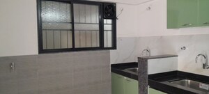 Kitchen in 2 BHK Apartment at Kohinoor Courtyard One, Wakad – for Sale