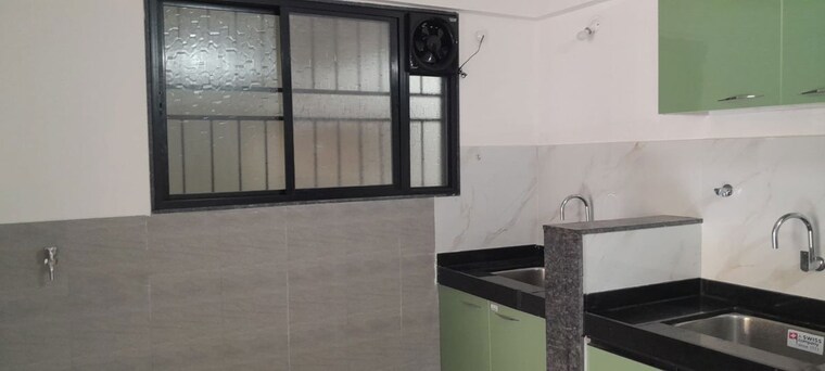 Kitchen, kohinoor-courtyard-one 2 Bedroom 718 Sq.Ft. Apartment In Wakad Pune 10651308