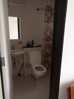 Bathroom in 3 BHK Apartment at Dahanukar Colony – for Rent