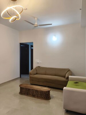 Living Room in 2 BHK Apartment at Duville Riverdale Grove, Kharadi – for Rent