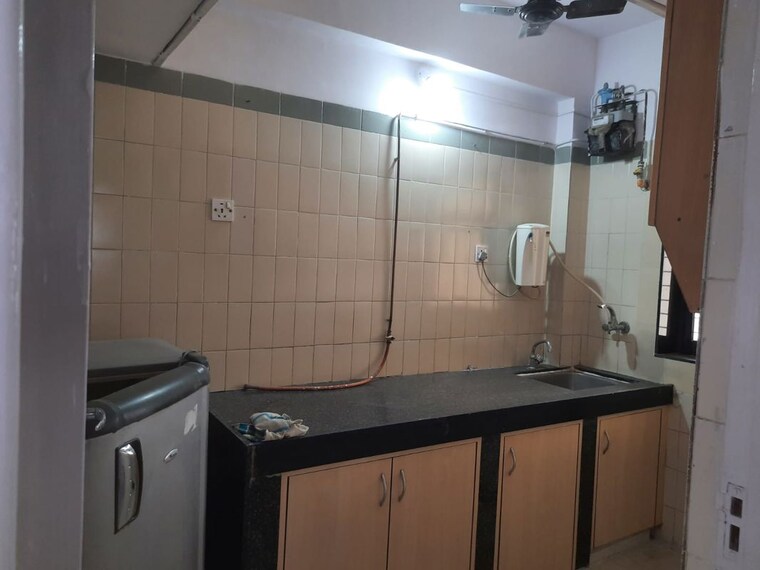 Kitchen, sun-glory 1 Bedroom 550 Sq.Ft. Apartment In Powai Mumbai 10651322