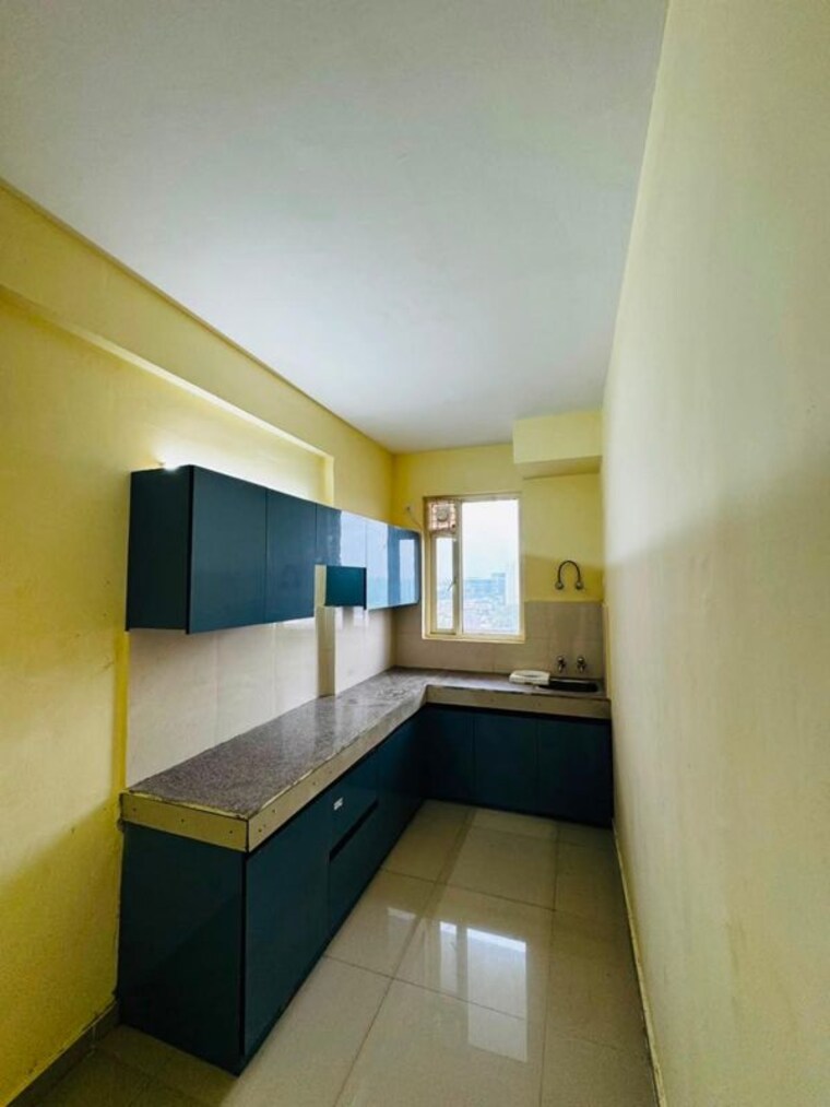 Kitchen, pyramid-midtown 2 Bedroom 678 Sq.Ft. Apartment In Sector 59 Gurgaon 10651363