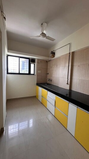 Kitchen in 2 BHK Apartment at Raheja Woods, Kalyani Nagar – for Rent