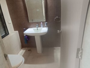Bathroom in 2 BHK Apartment at Magarpatta City Cosmos, Magarpatta Road – for Rent