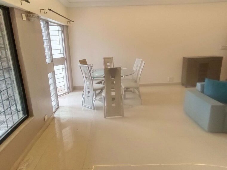 Living Room, magarpatta-daffodils-apartment 2 Bedroom 850 Sq.Ft. Apartment In Hadapsar Pune 10651477