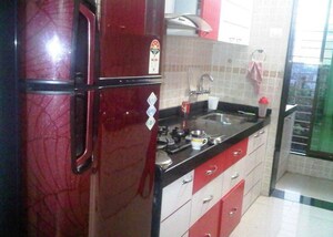 Kitchen in 2 BHK Apartment at Dedhia Palatial Height, Powai – for Rent