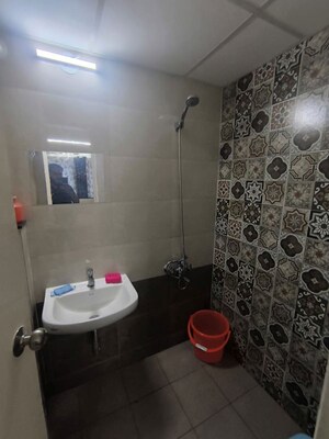 Bathroom in 2 BHK Apartment at Mahindra Happinest Tathawade Phase 1, Tathawade – for Rent