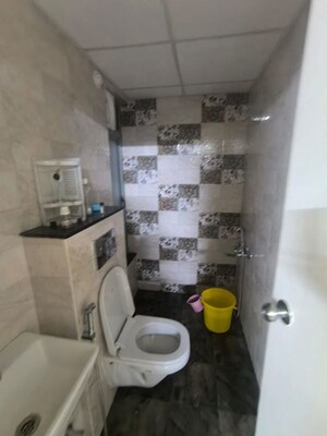 Bathroom in 2 BHK Apartment at Mahindra Happinest Tathawade Phase 1, Tathawade – for Rent