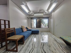 Living Room in 2 BHK Apartment at Juhu – for Rent