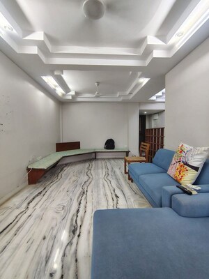 Living Room in 2 BHK Apartment at Juhu – for Rent