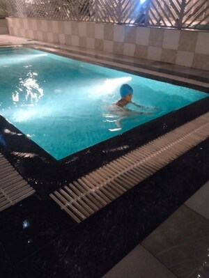 Swimming Pool in 3 BHK Apartment at JKG Palm Court, Sector 16c Greater Noida – for Rent