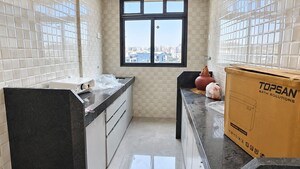 Kitchen in 2 BHK Apartment at Dhanlaxmi Dhananjay Hill View, Nalasopara West – for Sale