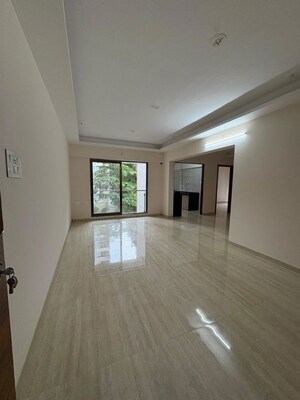 Living Room in 3 BHK Apartment at Je And Vee Om Trimurti, Malad East – for Sale