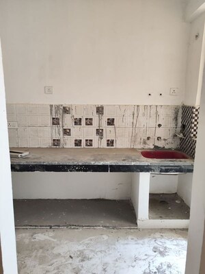 Kitchen in 2 BHK Apartment at Eureka Diya Green City, Raj Nagar Extension – for Sale