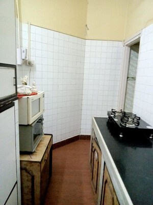 Kitchen in 2 BHK Apartment at Senapati Bapat Marg – for Rent